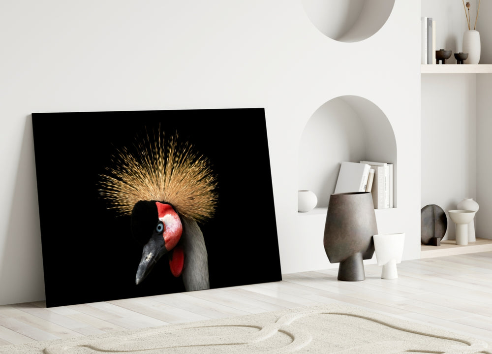 Crowned Crane glass wall art styled above a desk in a study