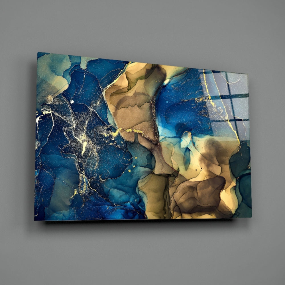 Close-up detail of cobalt cliff meeting gold tide along ivory veins