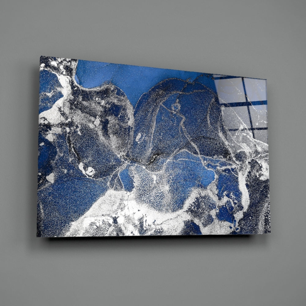 Close-up detail of ivory spill cutting through cobalt clouds