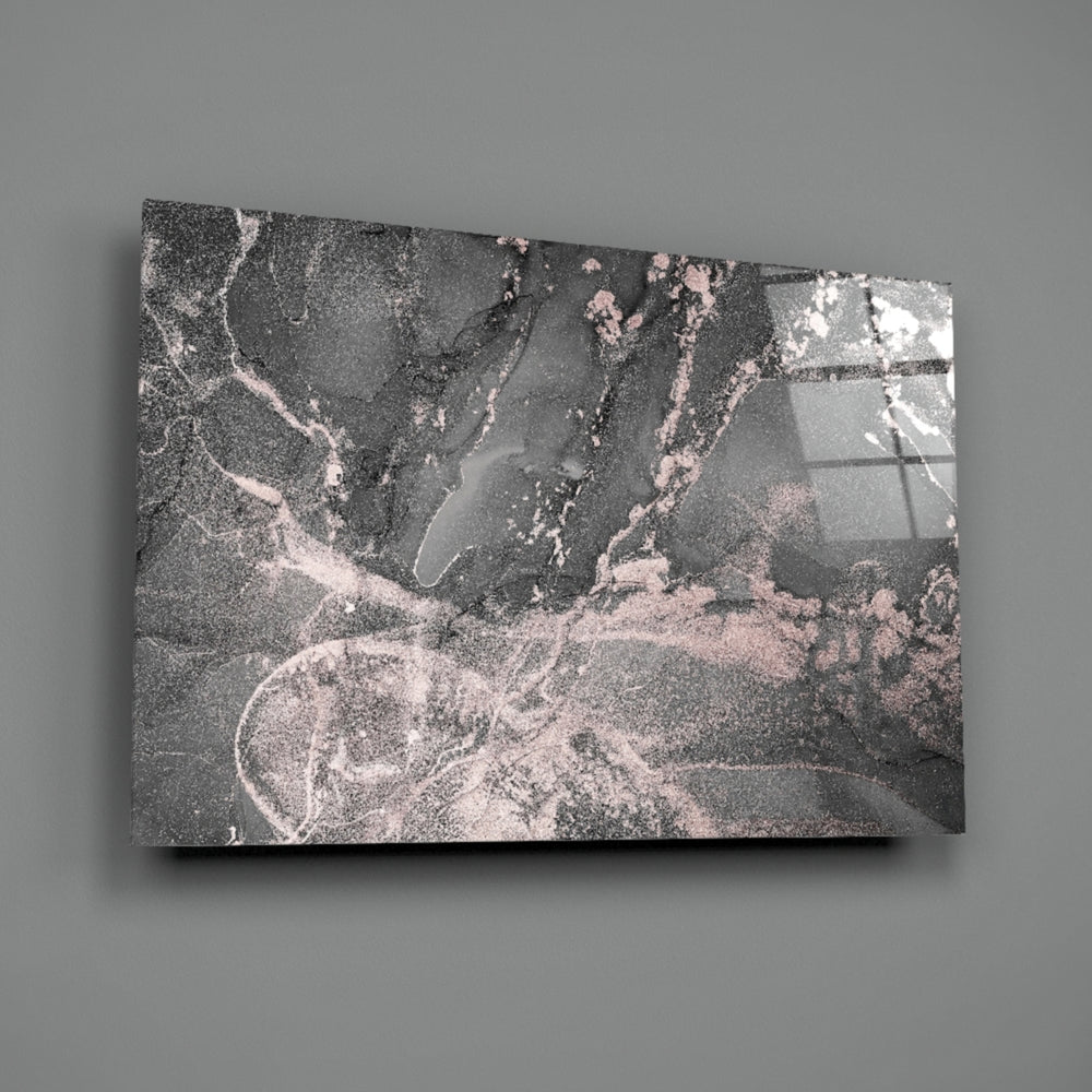 Close-up detail of blush-pink veins threading through charcoal smoke