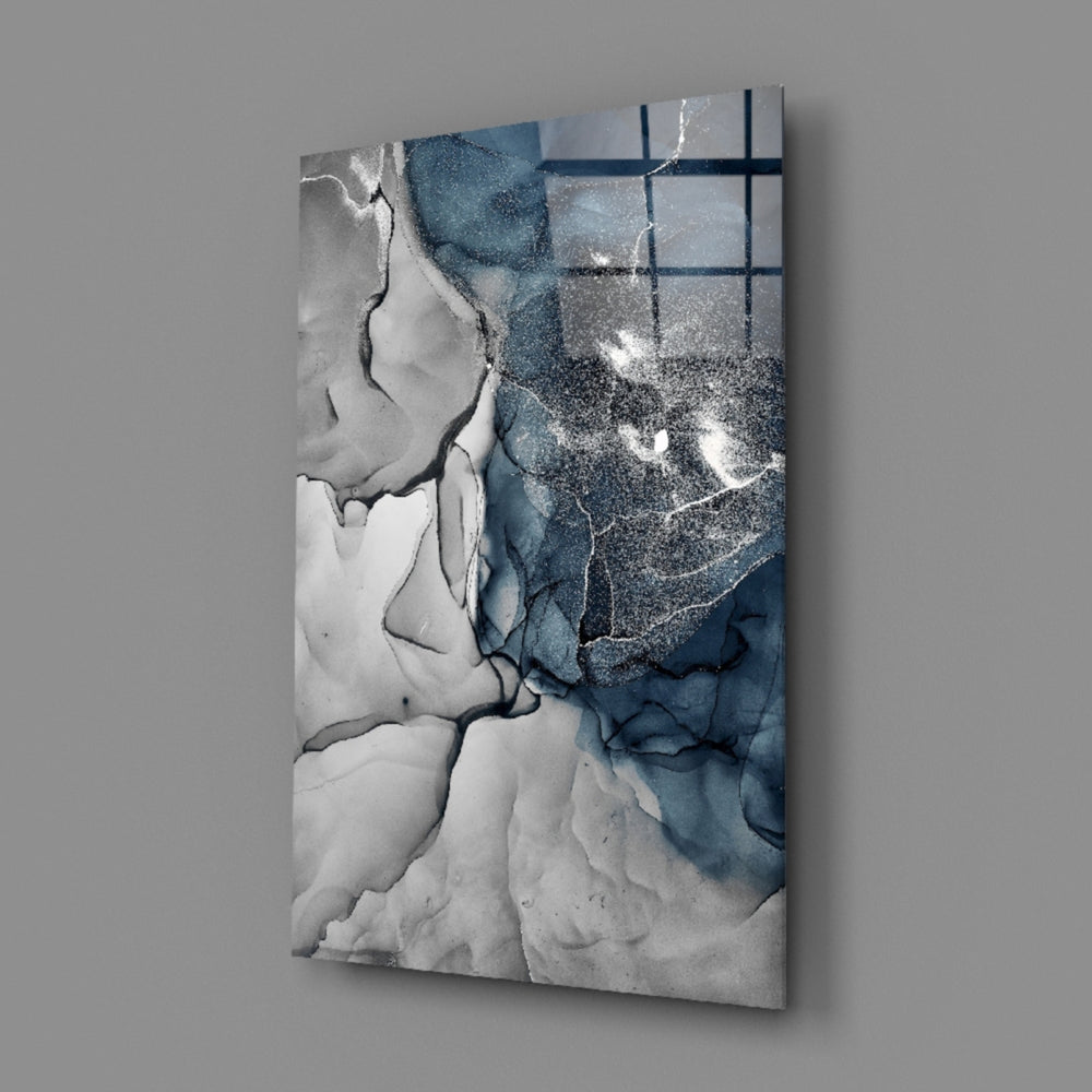 Close-up detail of navy ink bloom meeting ivory marble along silver veining