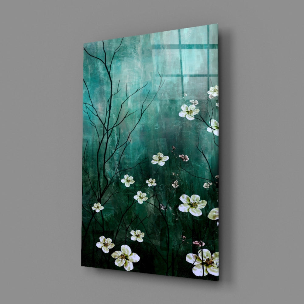 Close-up detail of white daisies floating against emerald mist