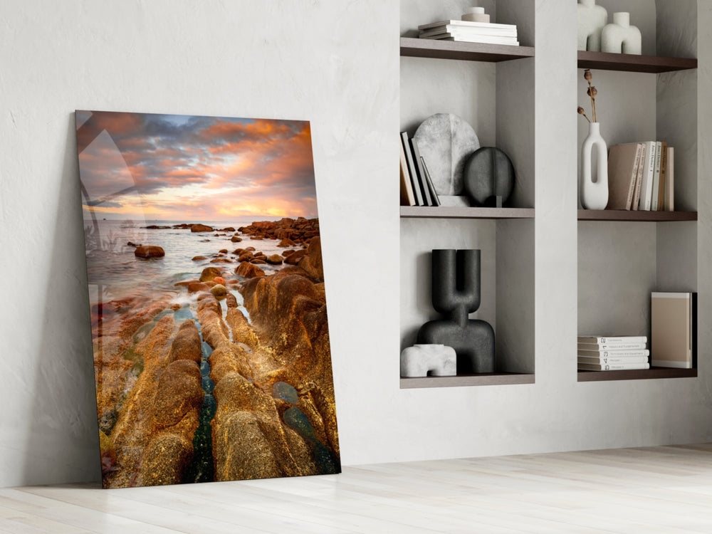 Golden Coast artwork anchoring a wall with coastal golden-hour palette