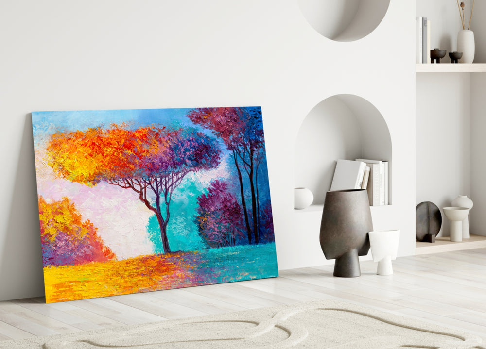 Autumn Pines glass wall art styled above a sofa in a living room