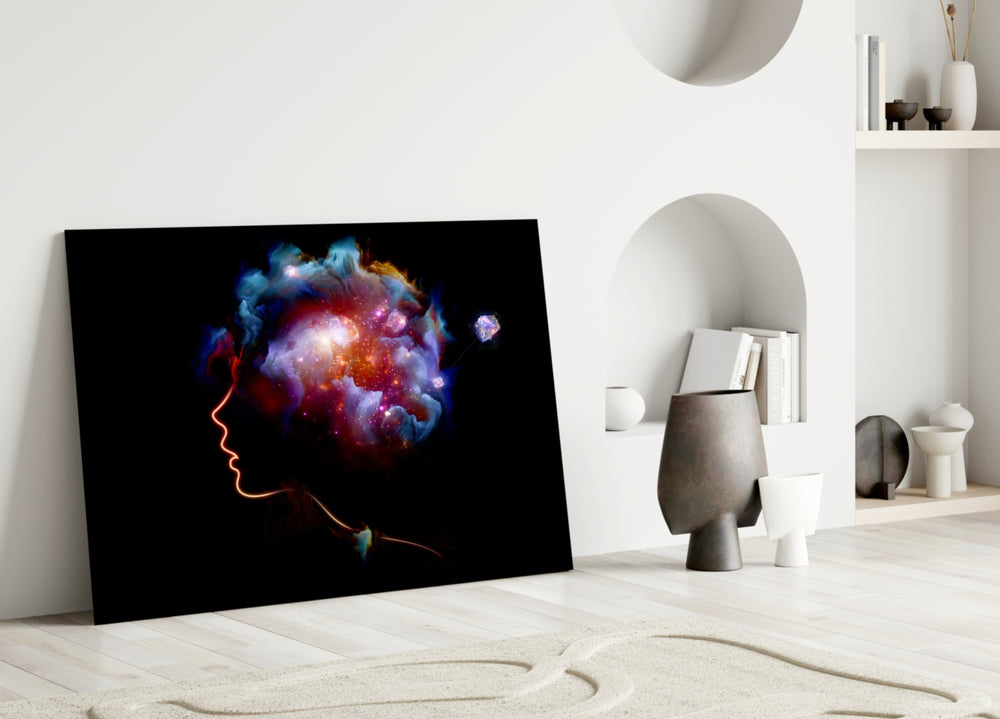 Cosmic Mind glass wall art styled above a desk in a creative office