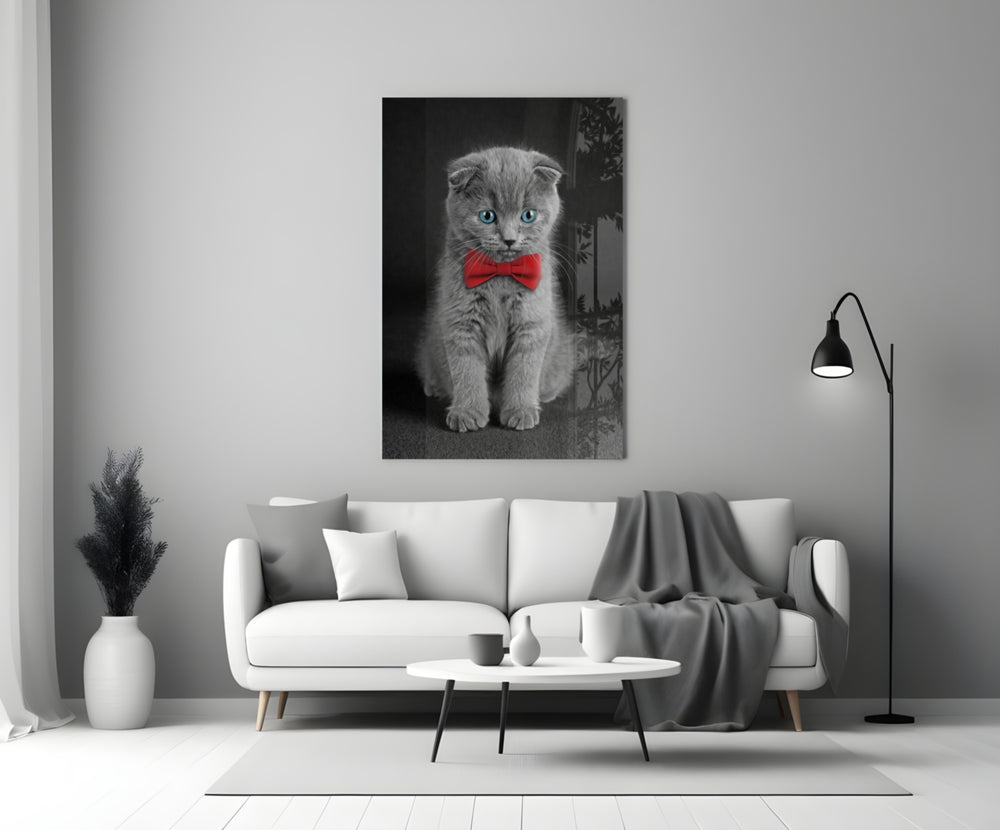 Bow-Tie Kitten glass wall art styled above a console in a kids room