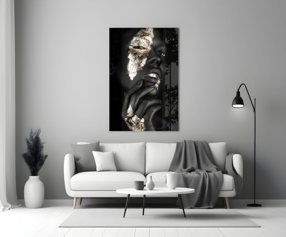 Gilded Gaze glass wall art styled above a sofa in a master bedroom