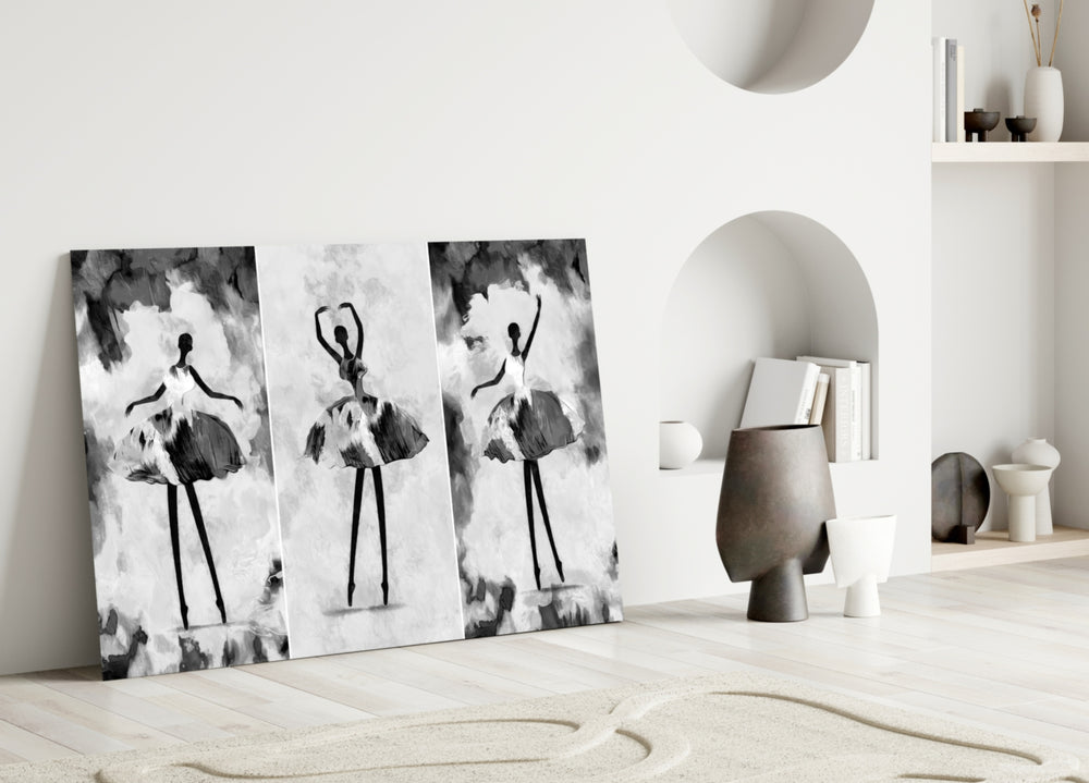 Ballet Triptych glass wall art styled above a sofa in a bedroom