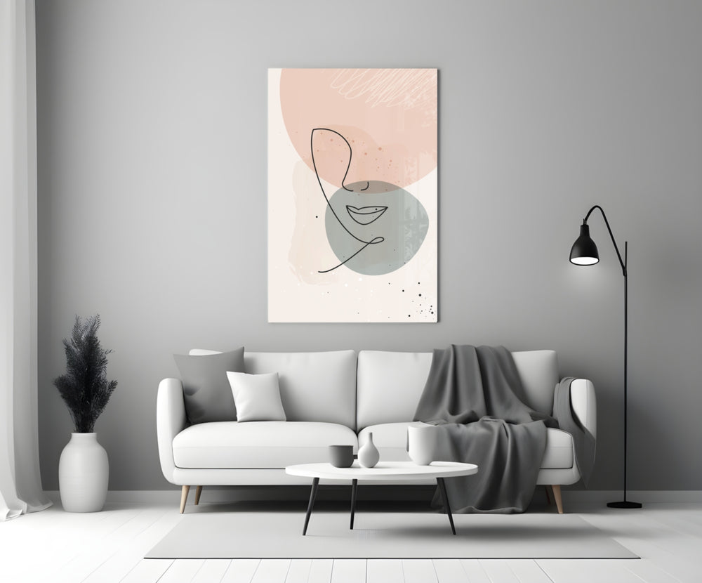 Line Portrait glass wall art styled above a sofa in a master bedroom