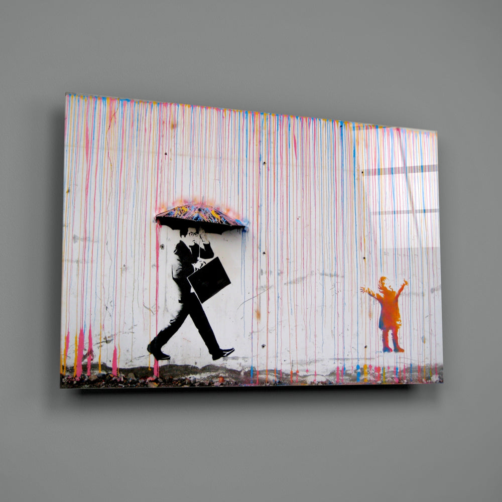 Color of Rain close-up showing rainbow rain streaming behind black-stencil businessman