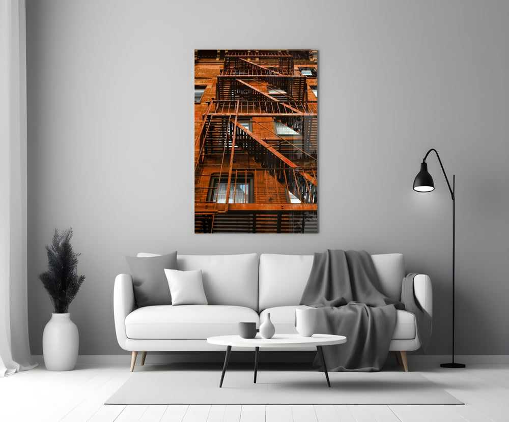 Orange Stairs glass wall art styled above a chair in a hallway