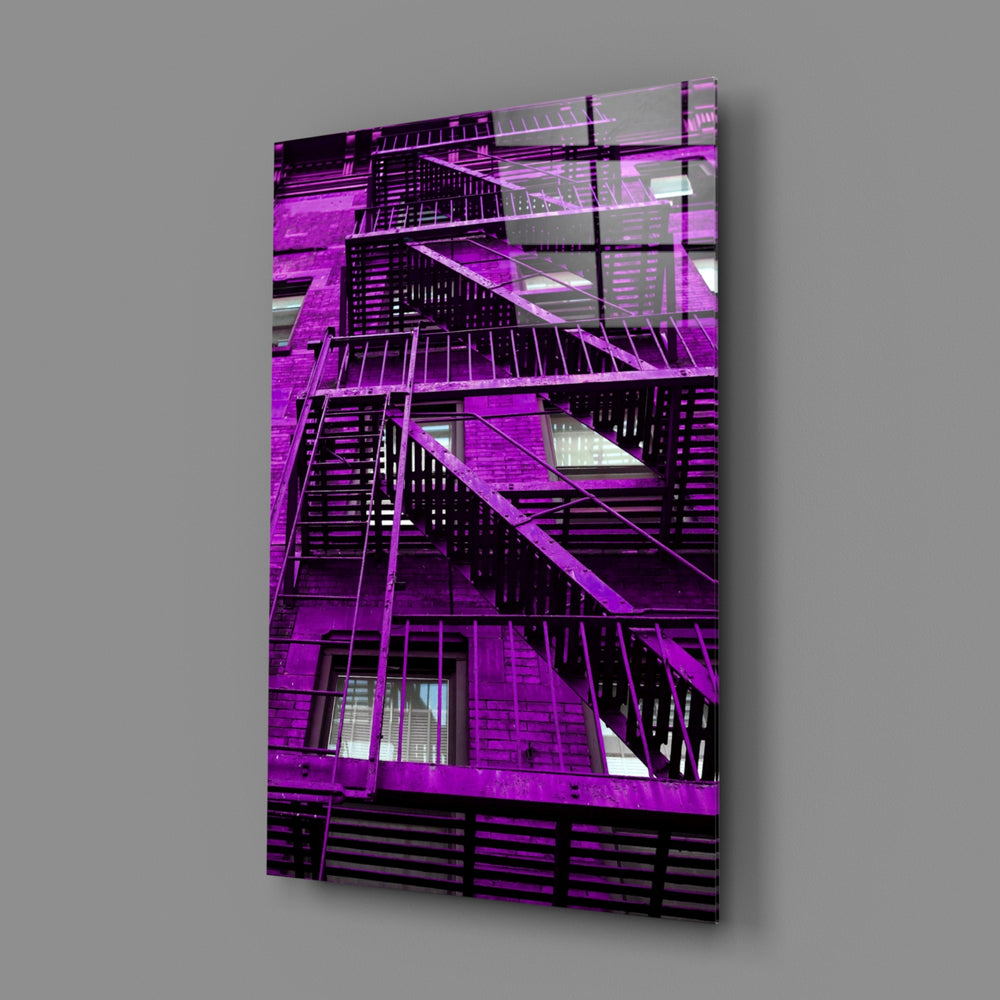 Purple Stairs close-up showing magenta iron railings against concrete facade