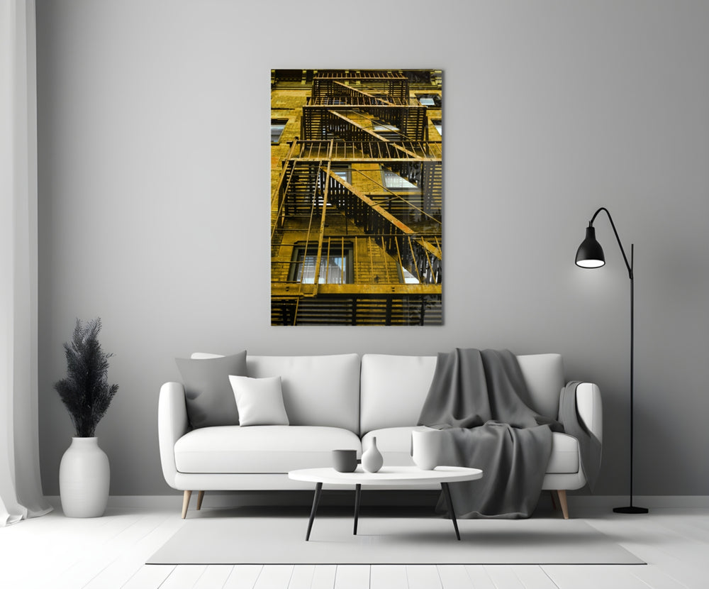 Yellow Stairs glass wall art styled above a sofa in a hallway