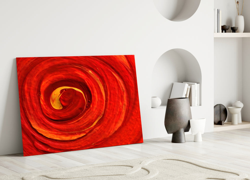 Red Vortex glass wall art styled above a sofa in a dining room
