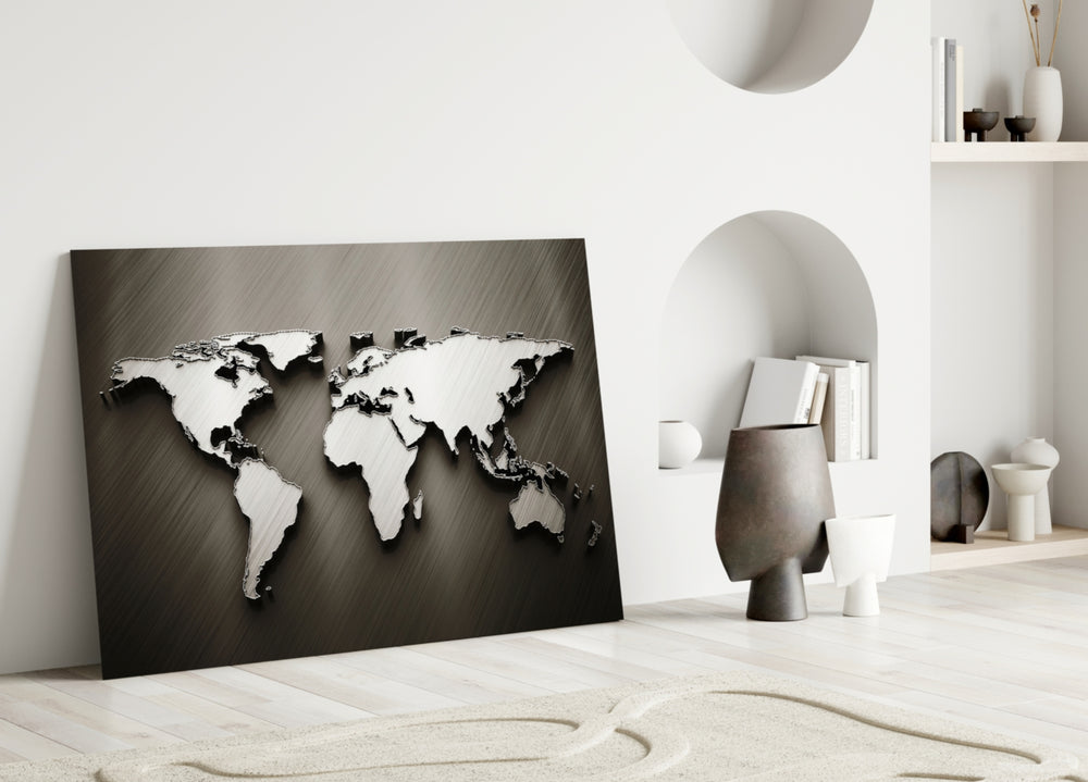 Chrome World Map glass wall art styled above a desk in a man's office