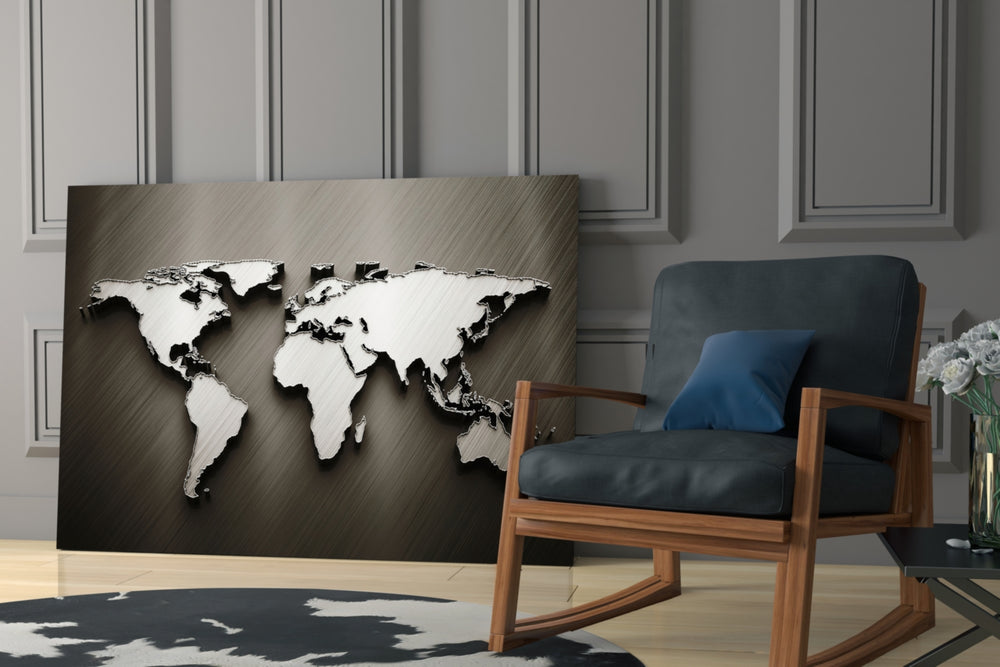 Chrome World Map artwork anchoring a wall with luxe executive palette