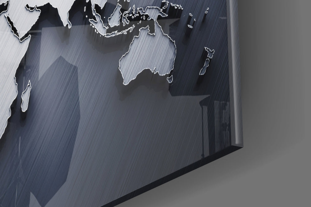 Silver World Map panel catching window light to reveal its tactile relief
