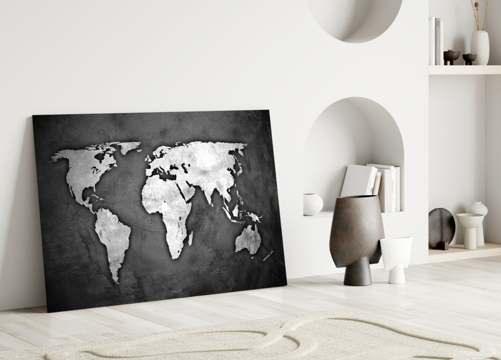 Grunge World Map glass wall art styled above a sofa in a man's office
