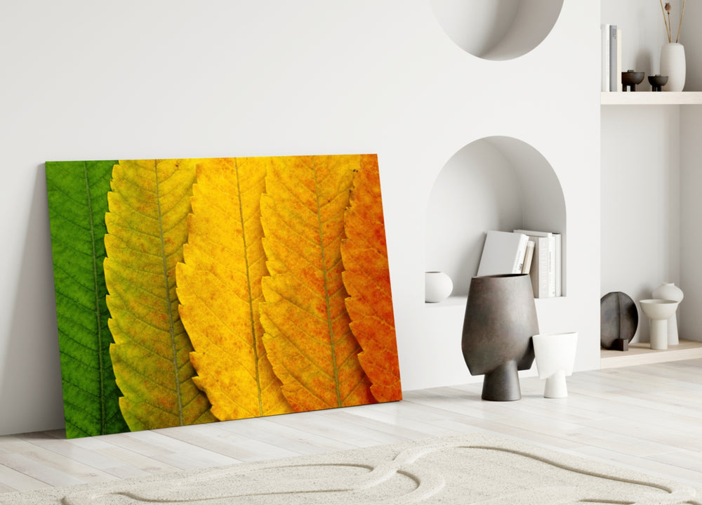 Autumn Leaves glass wall art styled above a console in a dining room