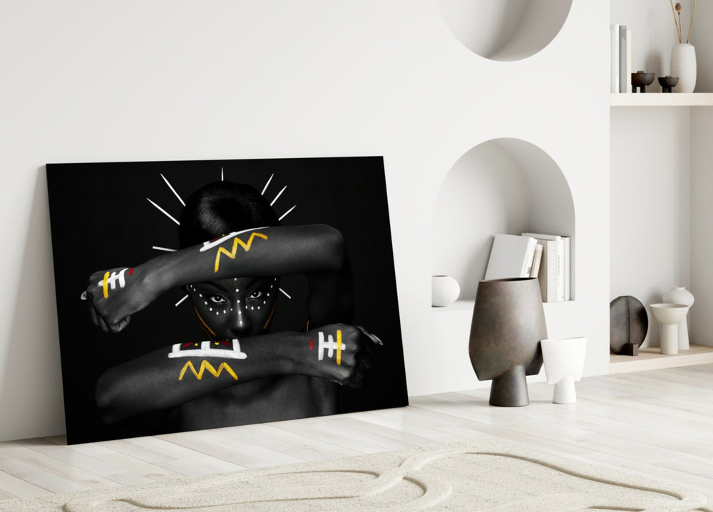 Tribal Spirit glass wall art styled above a credenza in a living room