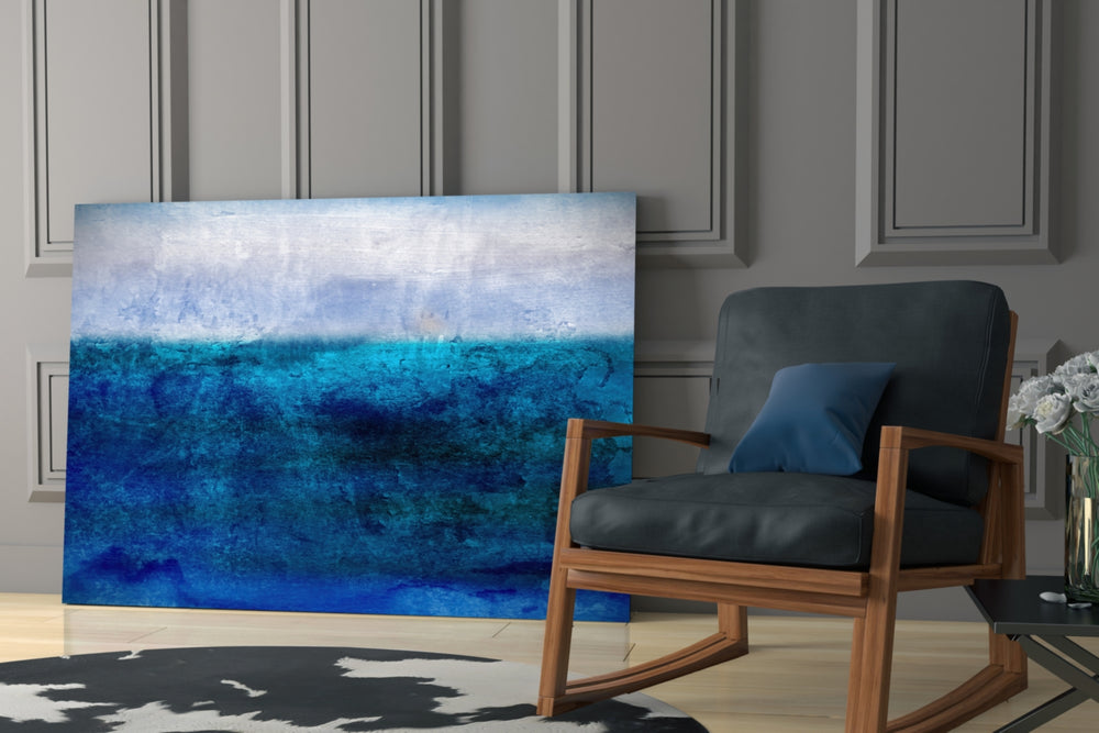 Indigo Sea artwork anchoring a wall with serene coastal palette