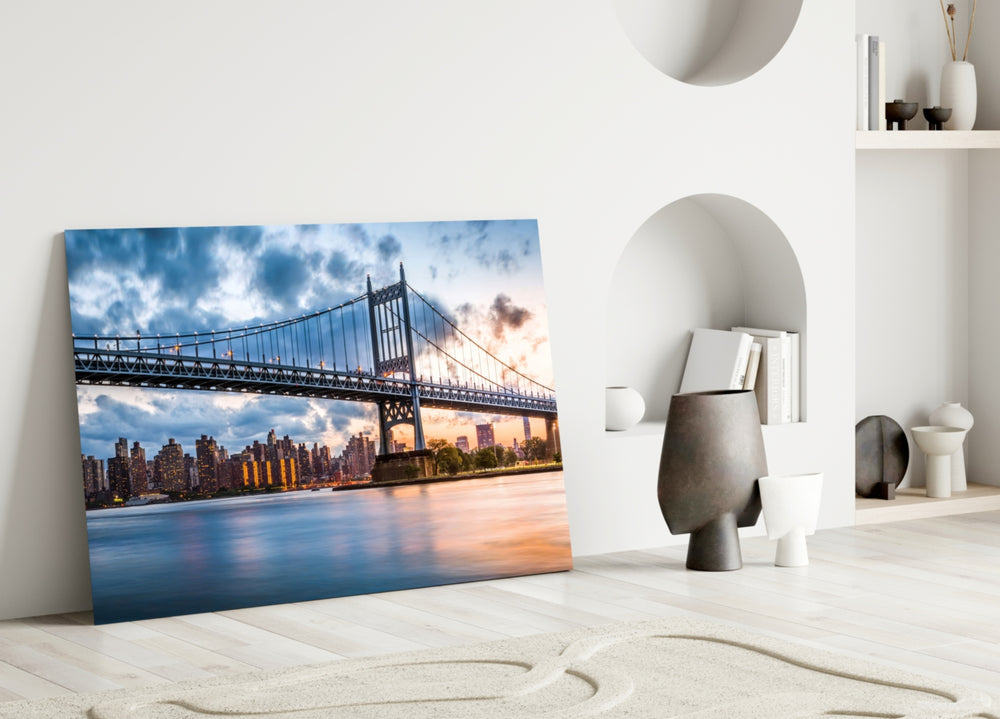 Triboro Bridge glass wall art styled above a credenza in a man's office