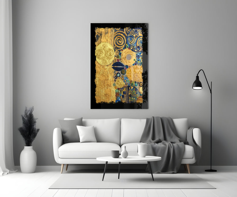 Golden Klimt glass wall art styled above a sofa in a living room