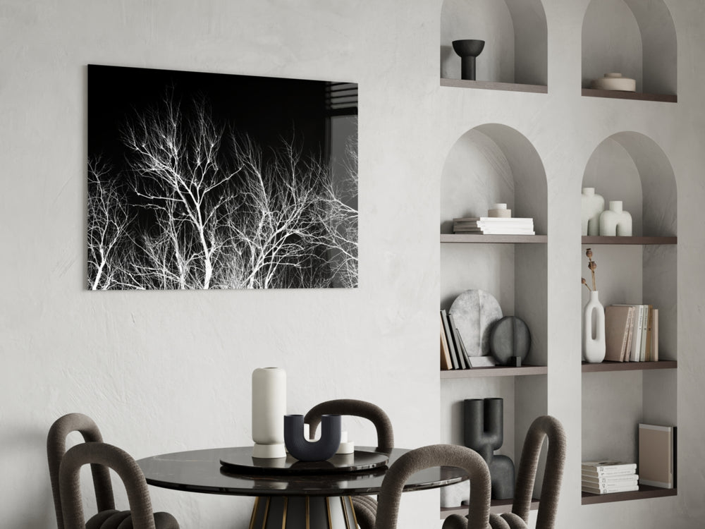 Night Trees glass print enhancing a living room with editorial drama