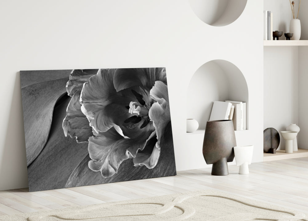 Monochrome Tulip glass wall art styled above a bed in a master bedroom