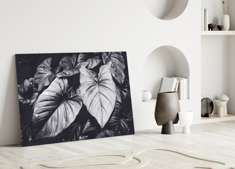 Monochrome Leaves glass wall art styled above a credenza in a bathroom