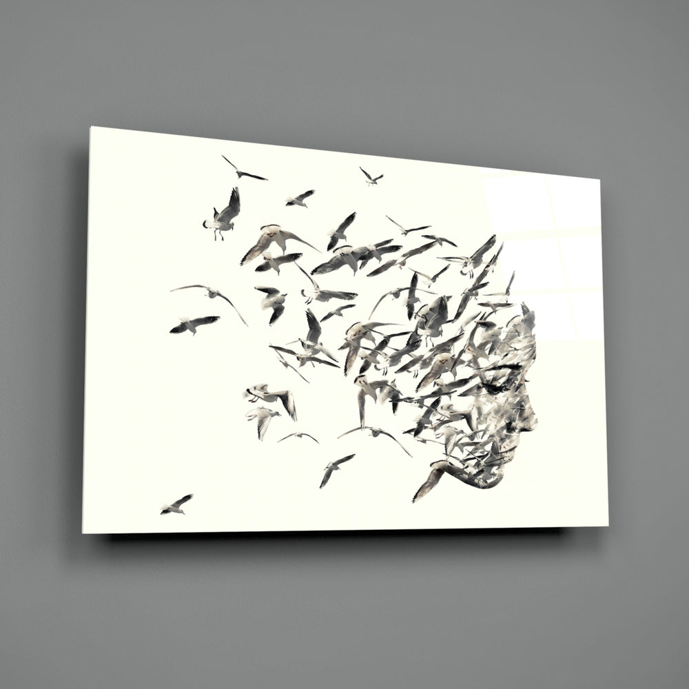 Bird Thoughts close-up showing flock of birds emerging from profile