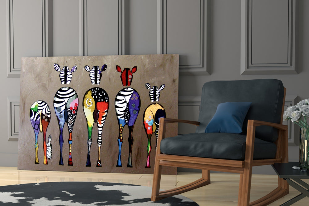 Colorful Zebras artwork above a dining table adding cheerful pop-art character