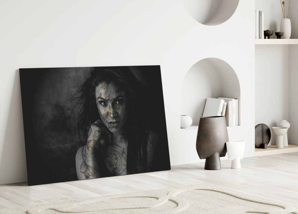 Tattooed Muse glass wall art styled above a side-table in a master bedroom