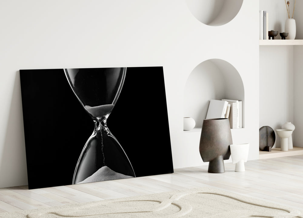 Hourglass Time glass wall art styled above a credenza in a study