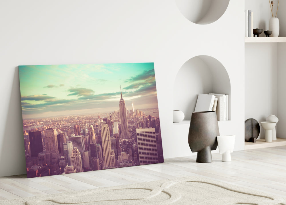 Manhattan Dawn glass wall art styled above a credenza in a living room