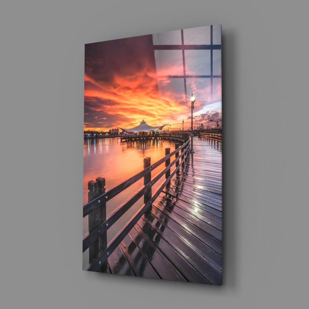 Pier Sunset close-up showing wooden pier extending toward magenta sunset