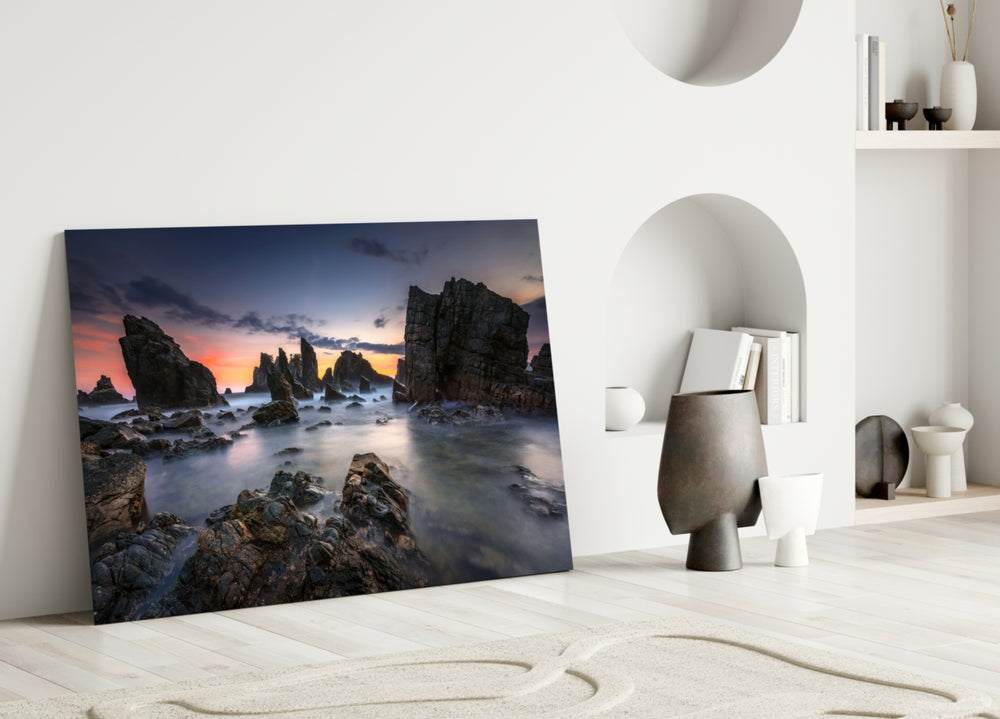 Coastal Cliffs glass wall art styled above a credenza in a living room