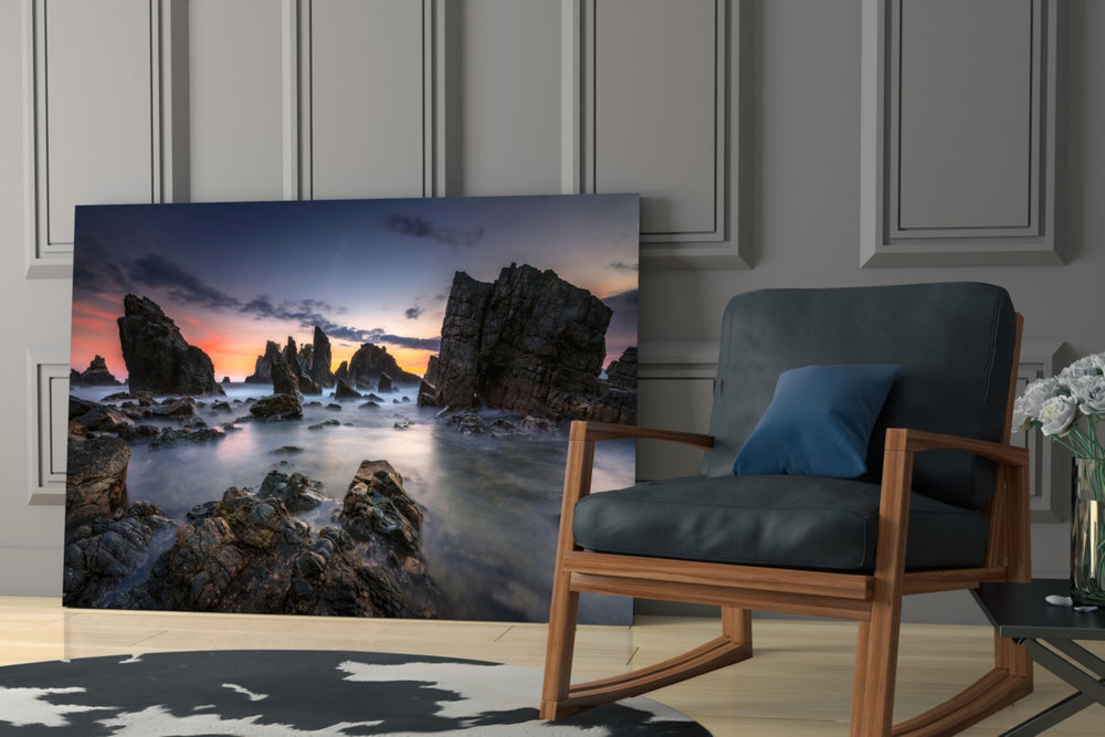 Coastal Cliffs artwork anchoring a wall with moody coastal palette