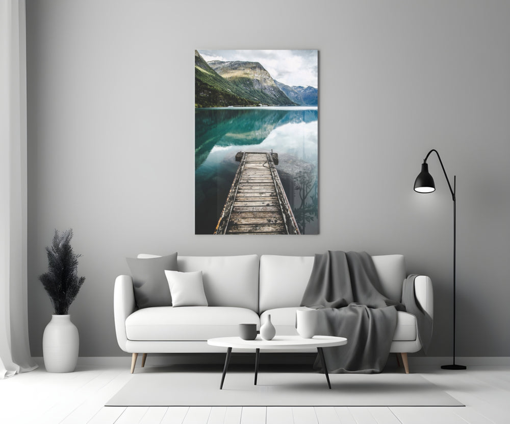 Dock glass wall art styled above a credenza in a living room