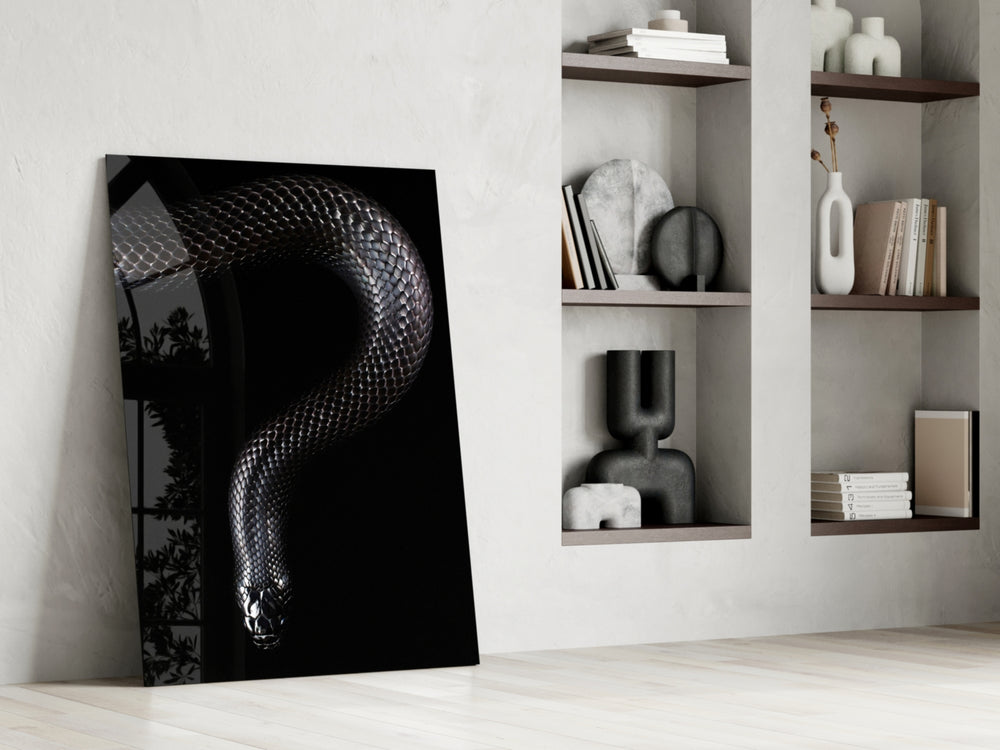 Snake artwork anchoring a wall with bold mysterious palette