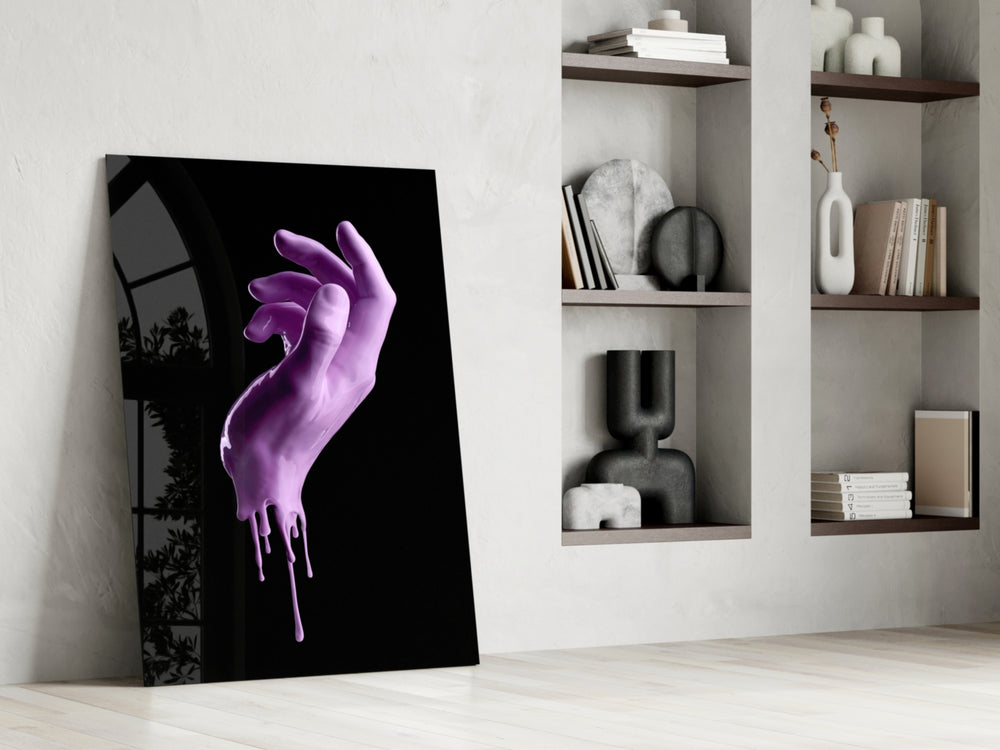 Hand artwork anchoring a wall with bold modern palette