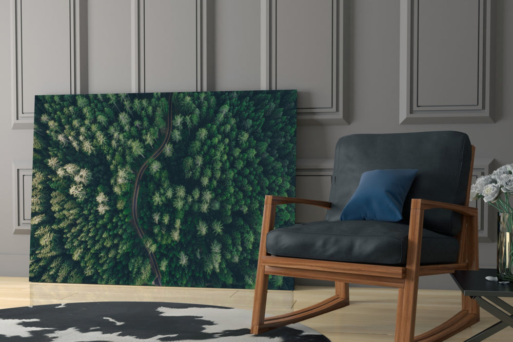 Forest artwork anchoring a wall with serene biophilic palette