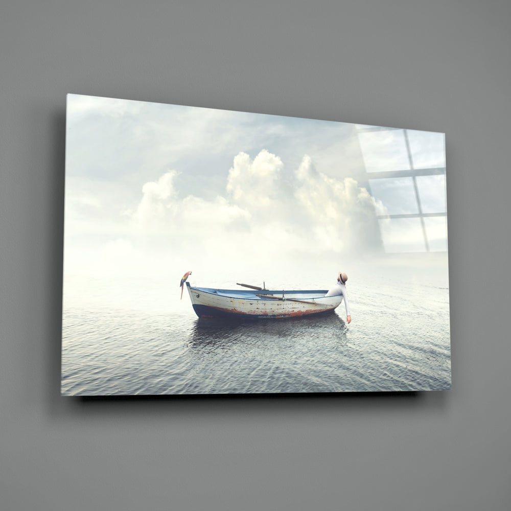 Marine close-up showing rowboat with figure reaching over to still water