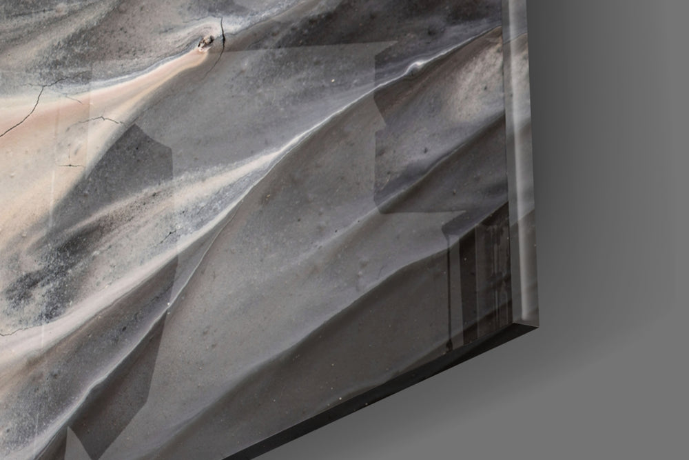 Abstract panel catching window light to reveal its tonal softness