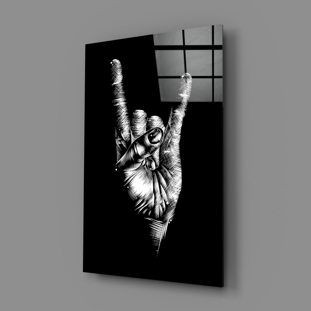 Horns Hands close-up showing scratchboard rock salute on velvet black