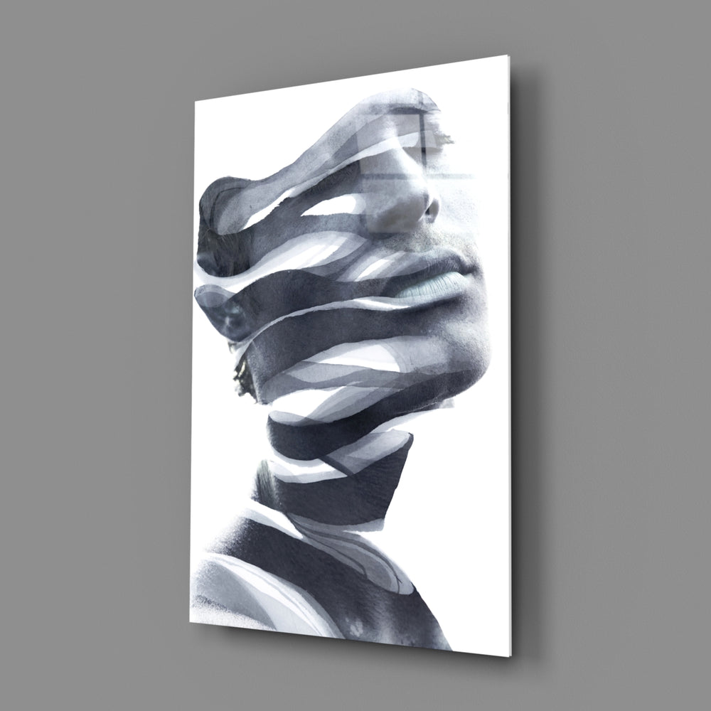 Man close-up showing portrait dissolving into ribbon distortion