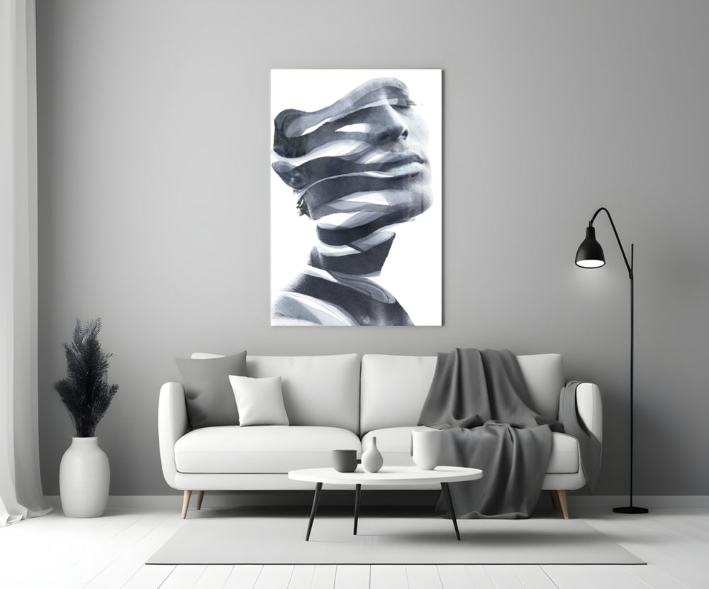 Man glass wall art styled above a credenza in a living room