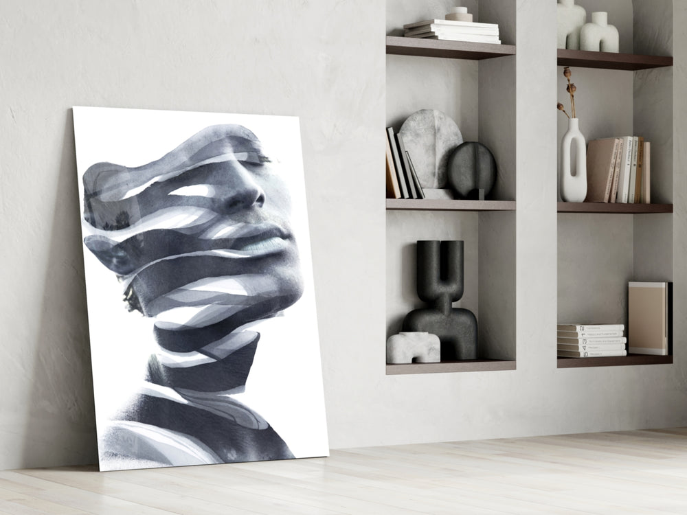 Man artwork anchoring a wall with contemplative monochrome palette