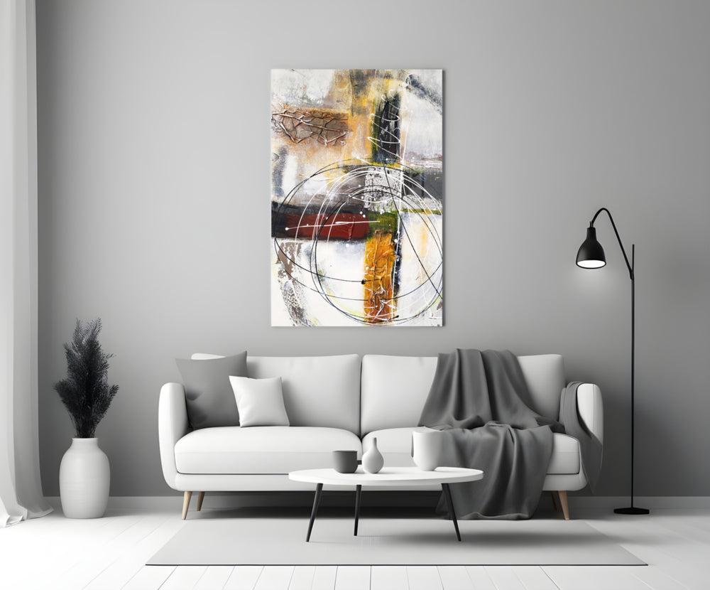 Abstract glass wall art styled above a console in a hallway