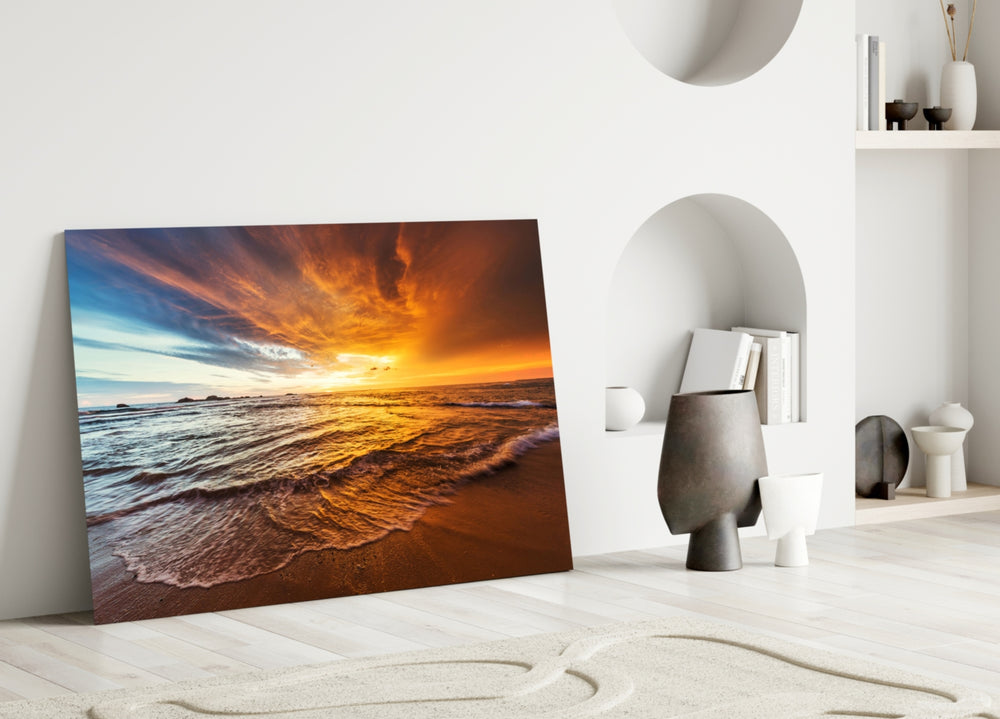 Sunset glass wall art styled above a credenza in a living room